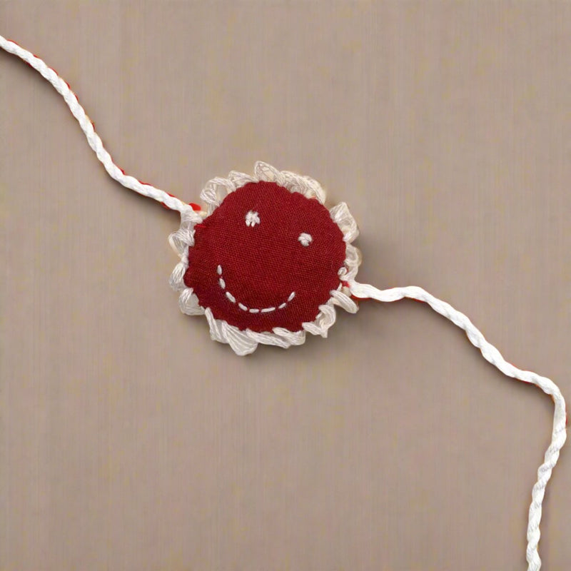 Cheery - Reusable Maroon Smiley Shaped Eco - friendly Kids Rakhi | Verified Sustainable Rakhi on Brown Living™