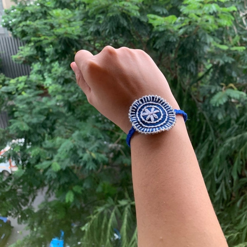 Dual Avtar Hand - embroidered Rakhi - Blue and White| Reusable | Verified Sustainable Rakhi on Brown Living™