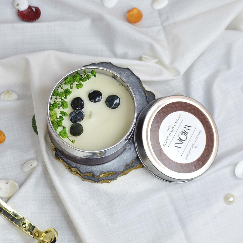 Oud Scented Soy Wax Candle in Tin with Flowers and Stones | Verified Sustainable Candles & Fragrances on Brown Living™