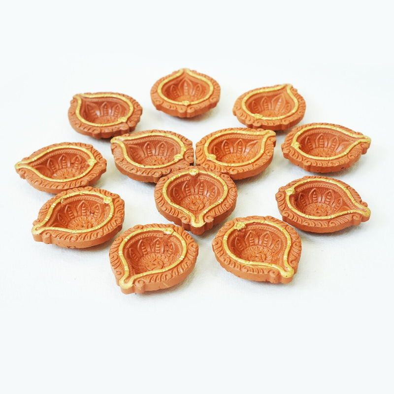 Buy Golden Ring Motiff Diya (Bankura1)- Diwali Special - Set of 12 Diyas & Cotton Wicks | Shop Verified Sustainable Products on Brown Living