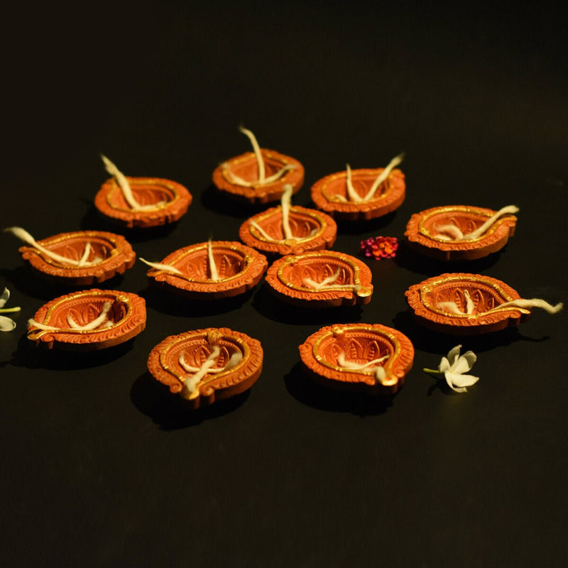 Buy Golden Ring Motiff Diya (Bankura1)- Diwali Special - Set of 12 Diyas & Cotton Wicks | Shop Verified Sustainable Products on Brown Living