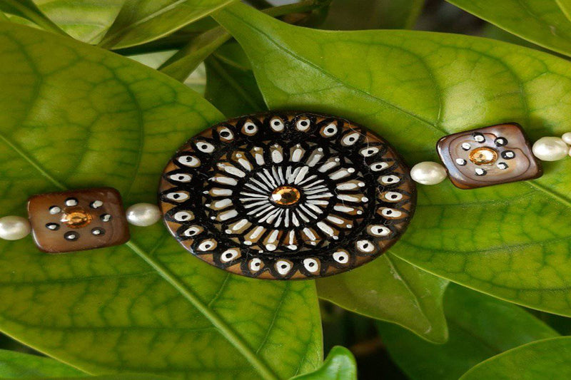 Buy Hand painted pearl shell rakhi | Shop Verified Sustainable Rakhi on Brown Living™