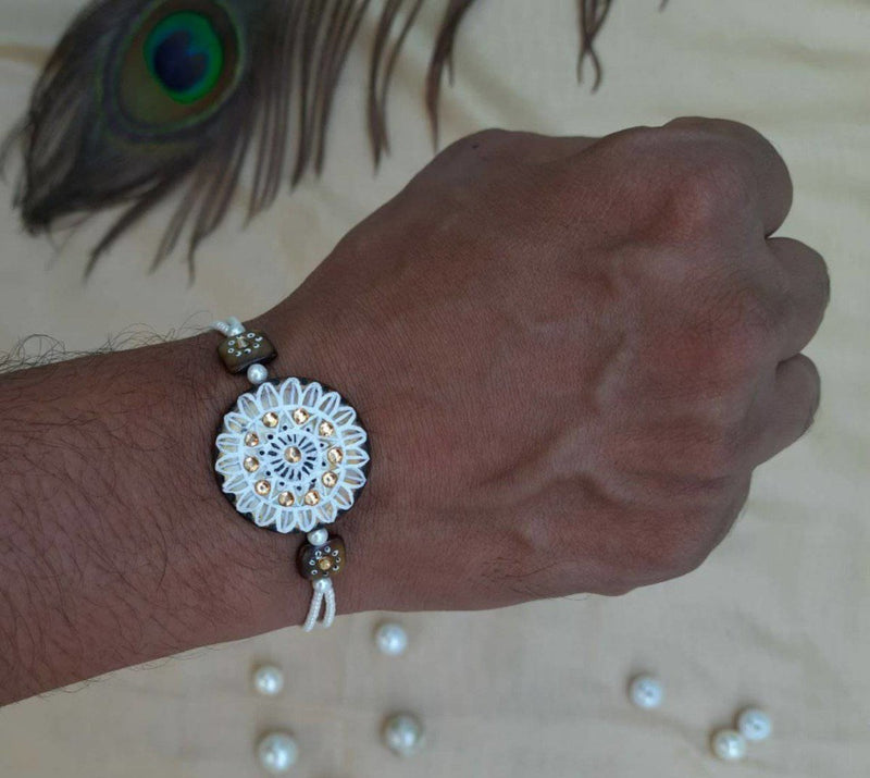 Buy Hand Painted Pearl Shell Rakhi | Shop Verified Sustainable Rakhi on Brown Living™