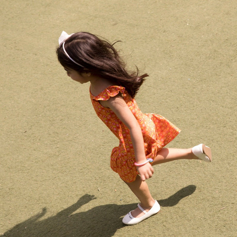 Buy Organic Cotton Strap Dress- Indian Flora Orange | Shop Verified Sustainable Kids Frocks & Dresses on Brown Living™