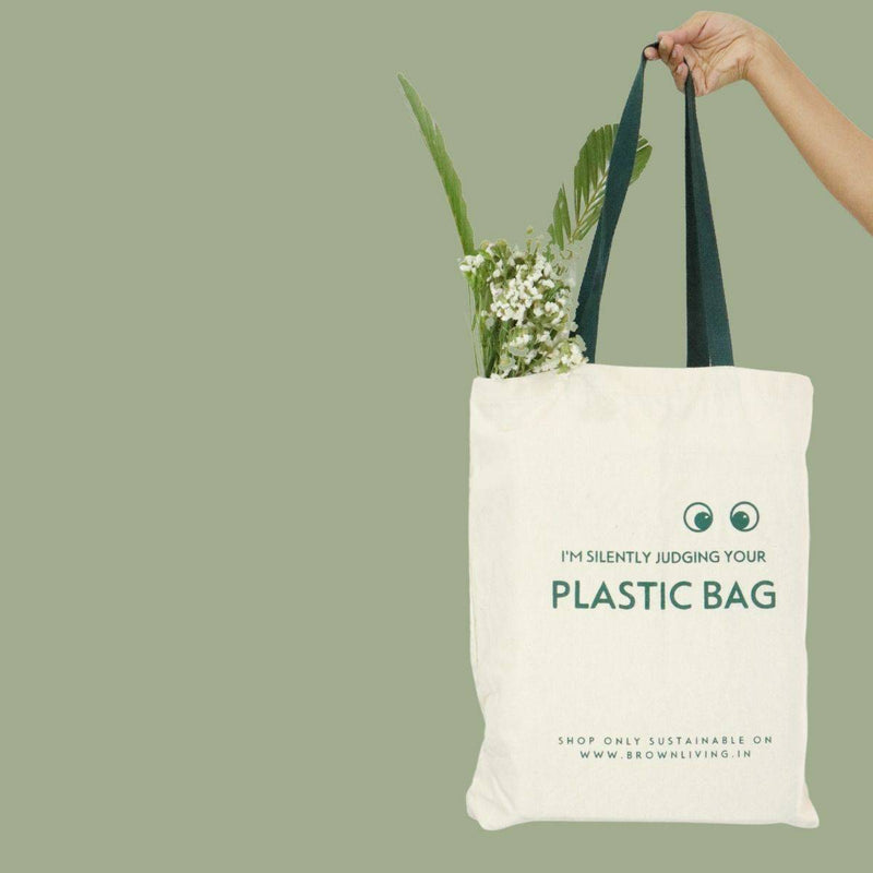 Buy Reusable Cotton Tote Bag- Silently Judging your Plastic Bag- Off White | Shop Verified Sustainable Tote Bag on Brown Living™