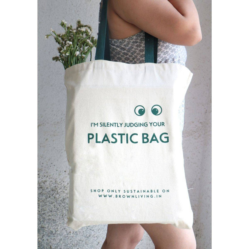 Buy Reusable Cotton Tote Bag- Silently Judging your Plastic Bag- Off White | Shop Verified Sustainable Tote Bag on Brown Living™