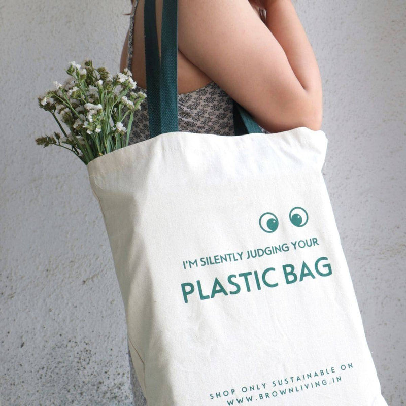 Buy Reusable Cotton Tote Bag- Silently Judging your Plastic Bag- Off White | Shop Verified Sustainable Tote Bag on Brown Living™