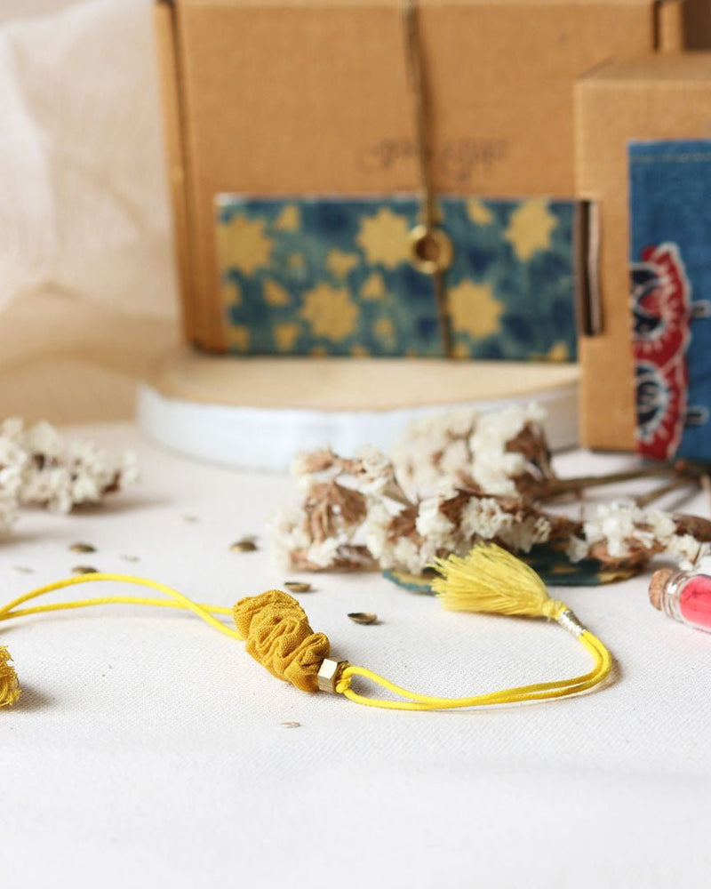 Buy Upcycled Artisanal Rakhi- Traditional Turmeric Yellow | Shop Verified Sustainable Rakhi on Brown Living™