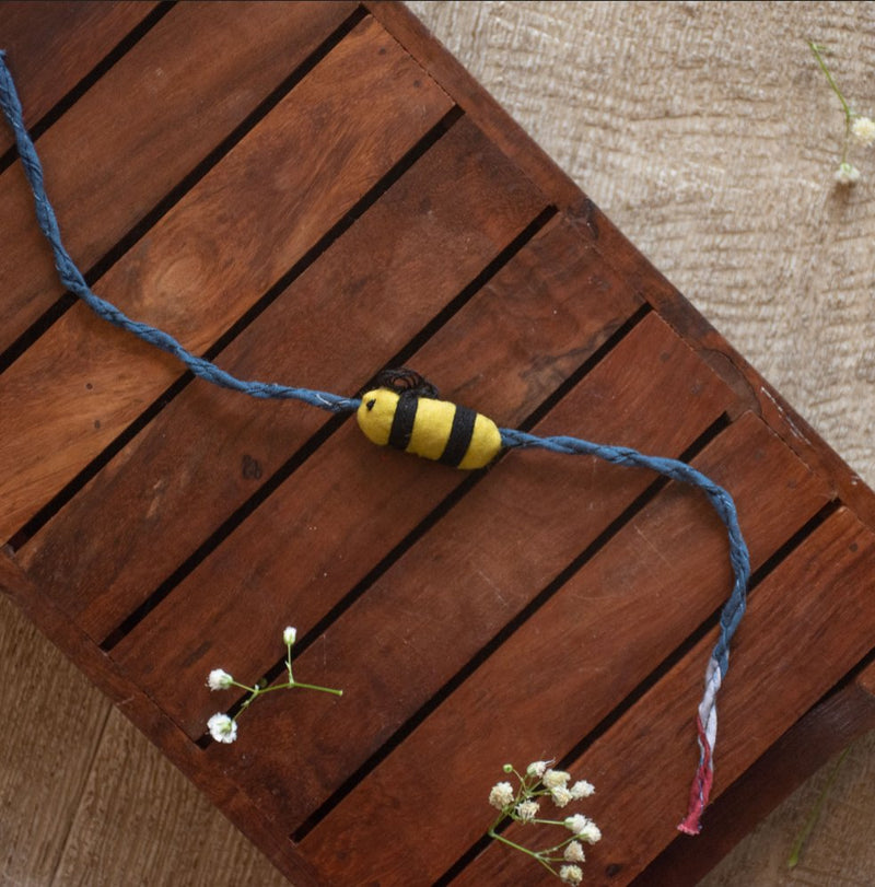 Buy Upcycled Hand Stitched Bee Kids Rakhi | Shop Verified Sustainable Rakhi on Brown Living™