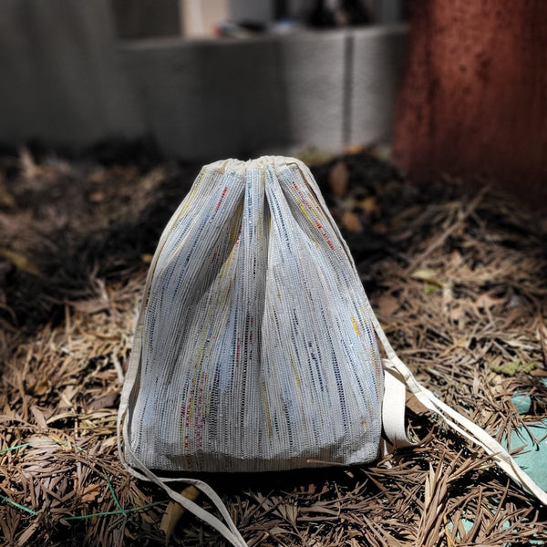 Buy Upcycled Handwoven Shimmery white and Yellow Light Back Pack | Shop Verified Sustainable Backpacks on Brown Living™