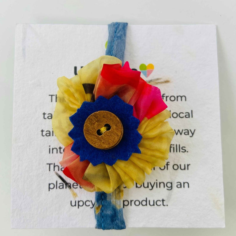 Buy Upcycled Rakhi- Yellow with colours and Coconut button | Shop Verified Sustainable Rakhi on Brown Living™