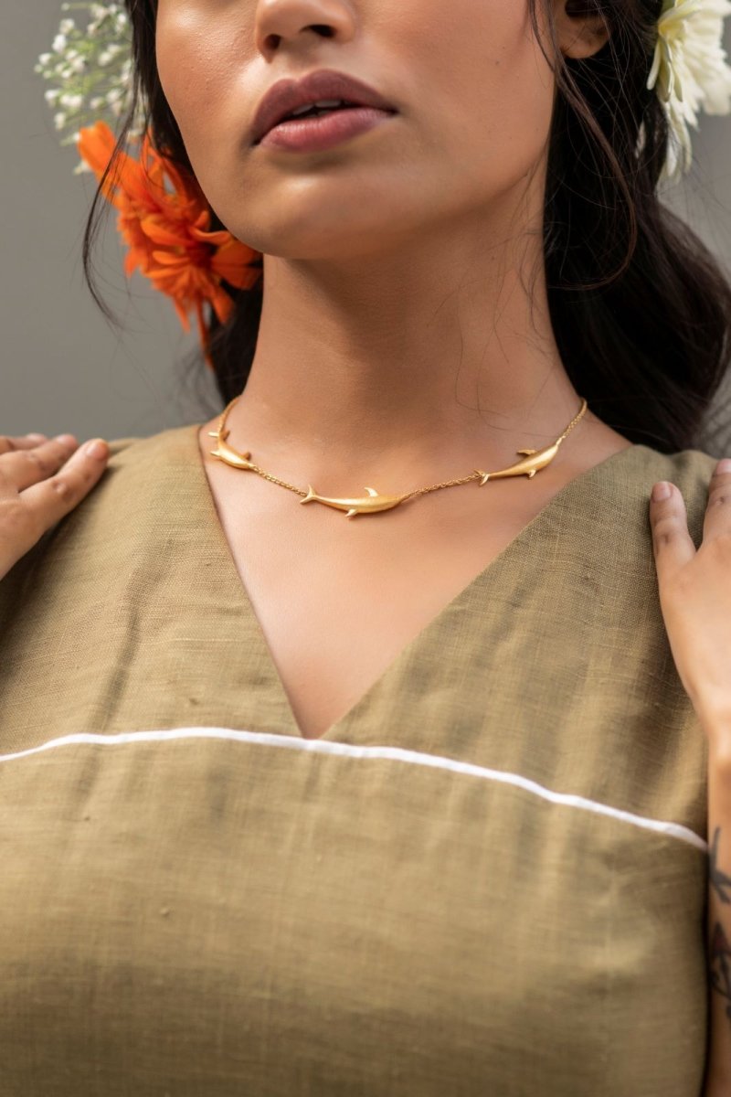 Buy Vaquita Dolphin Brass Necklace - Gold | Shop Verified Sustainable Womens Necklaces on Brown Living™