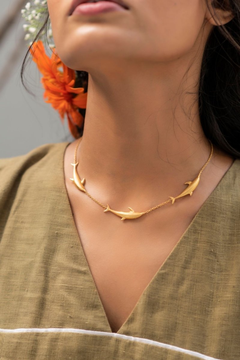 Buy Vaquita Dolphin Brass Necklace - Gold | Shop Verified Sustainable Womens Necklaces on Brown Living™