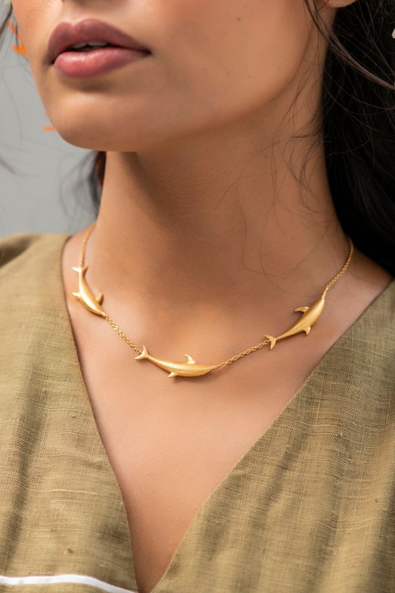 Buy Vaquita Dolphin Brass Necklace - Gold | Shop Verified Sustainable Womens Necklaces on Brown Living™